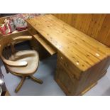 20th cent. Pine twin pedestal desk with keyboard slide, 2 drawers and 2 cupboards. 59ins. x 29ins. x