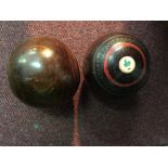 Sporting & Pastimes: Flat green 'lignum vitae' wooden bowls (5ins.) bias 3. One pair by Jaques & Son