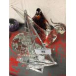 Glassware: A red glass penguin, fish, bird plus a sailing boat (4).