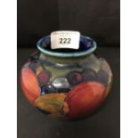 Moorcroft - The Newman Collection: c1925 Small squat ovoid vase, pomegranate pattern on dark blue