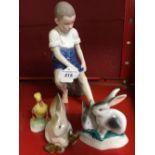 20th cent. Ceramics: Royal Copenhagen figure no:520 Boy sitting on a rock, plus 'Hollohaza' rabbit