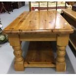 20th cent. Pine coffee table on turned supports. Open shelf below. 36ins. x 18ins. x 22ins.