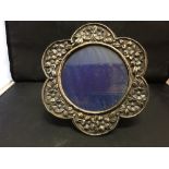 Hallmarked Silver: Circular frame with embossed floral decoration, London marks, maker G.H. possibly
