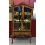 20th cent. Walnut reproduction display cabinet, domed top, twin moulded doors above 2 drawers. The