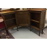 20th cent. Oak corner cupboard, central single door flanked with two open shelved recesses. 60ins. x