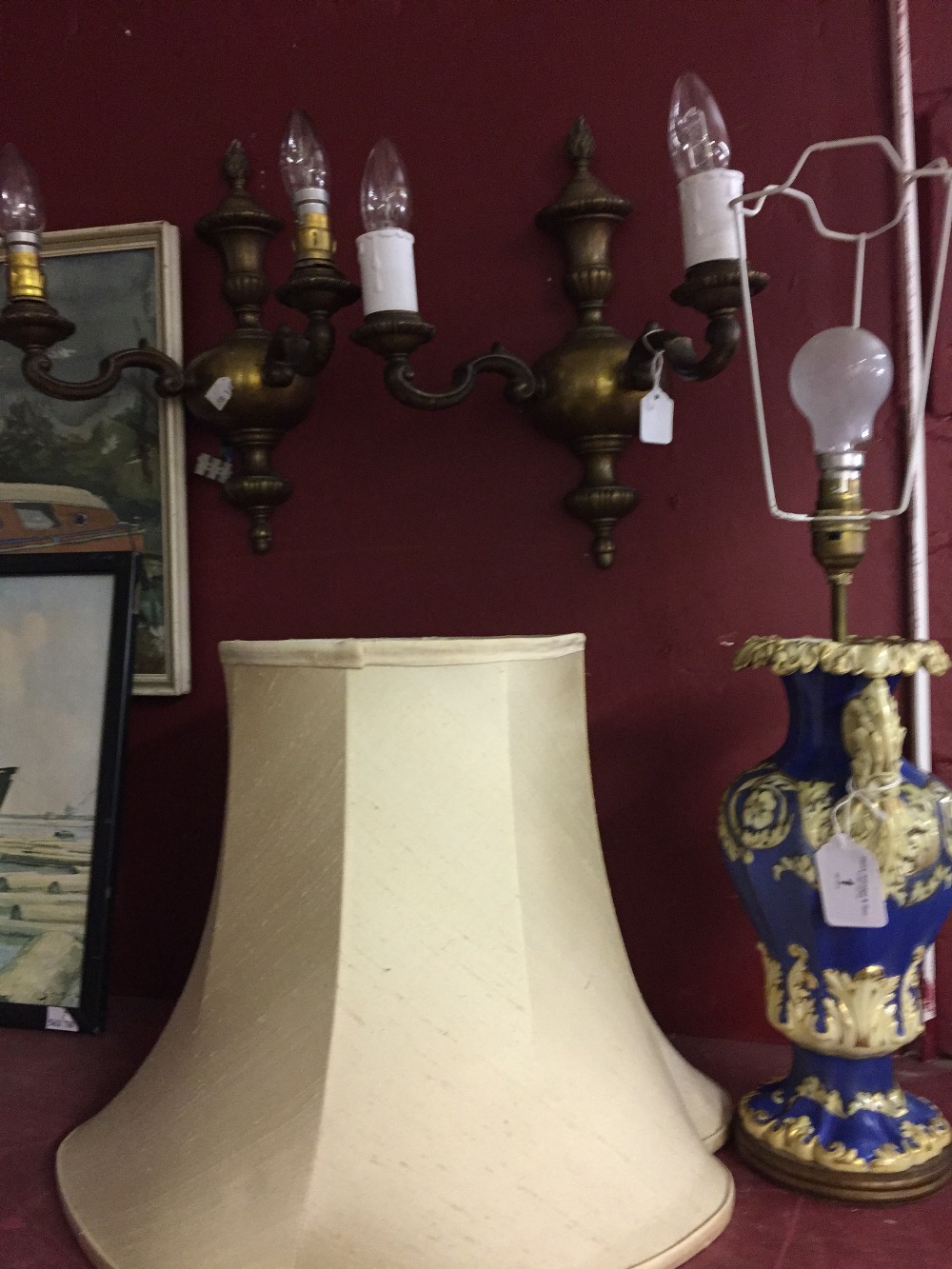 Lighting: 20th cent. Brass wall lights, a pair. 13ins. long, 7ins. projection. Plus a vase, blue and