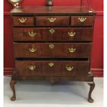 18th cent. Mahogany and oak chest on stand, 3 over 3 graduated drawers, branded inlay and brass