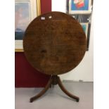 Early 19th cent. oak tilt top table 31½ins. diameter x 27ins. high.