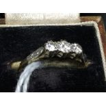 Gold Jewellery: 3 stone diamond set engagement ring, shank stamped 18ct and Plat (tested).