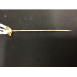 Yellow Metal: Seed pearl and bar tie pin. Tested 9ct. gold. Length approx. 2¼ins. 0·8gms.