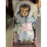 20th cent. Collectors Dolls: Leonardo Collection Boy doll - blue sky suit with mittens, cot blankets