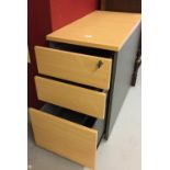 20th cent. Beech effect filing cabinet. Three drawers with key. 15½ins. x 28ins. x 31½ins.