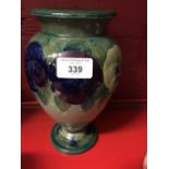 Moorcroft - The Newman Collection: c1914 Pale green ground baluster shaped vase in the pansy