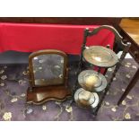 20th cent. Treen ware: Oak 3 tier articulated cake stand and a mahogany free standing, swivel