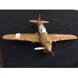 Toys: Marx Brothers tinplate Curtiss P/40 brown Warhawk fighter plane with box.