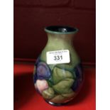 Moorcroft - The Newman Collection: c1952 Baluster vase, Anemone pattern on green ground, 6½ins.