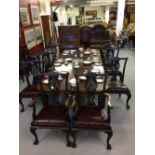 19th cent. Mahogany dining chairs, ornate pierced slat back carved columns and cresting rail and