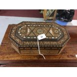 20th cent. Mixed wood work box inlaid with mother of pearl, bone and fruit woods with key.
