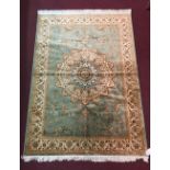 @21st cent Rugs: Keshan rug, green ground. 1.90 x 1.40.