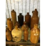 19th cent. & later stoneware ink, liqueur bottle including Glasgow Pottery Company. (12).