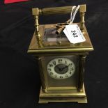 19th cent. Brass repeater carriage clock French enamel dial, black Roman numerals.