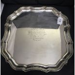 Hallmarked Silver: Salver inscribed with presentation notation, scallop edge, four paw feet. Chester