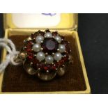 Hallmarked Gold: 9ct. Dress ring, central red stone with pearl and red stone cluster.