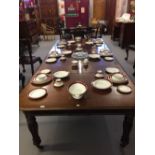 19th cent. Mahogany dining table straight pull out mechanism turned and gadrooned supports on