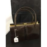 Fashion: Mappin & Webb, brown snakeskin handbag. Classic shape, suede lined, zip compartment. Mappin