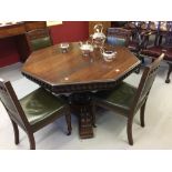 Victorian oak octagonal single pedestal heavily carved dining table retailed Pearce of Bristol
