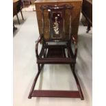 20th cent. Hardwood rocking chair with mother of pearl inlay.