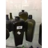 Bottles: 18th cent. Green glass gin bottles. Pig snout tapering sides, 10½ins. x 10ins. (x 2) 3