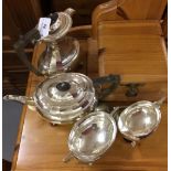 20th cent. Plated Ware: Tea set comprised of hot water pot, teapot, sugar bowl, and a milk jug (4).