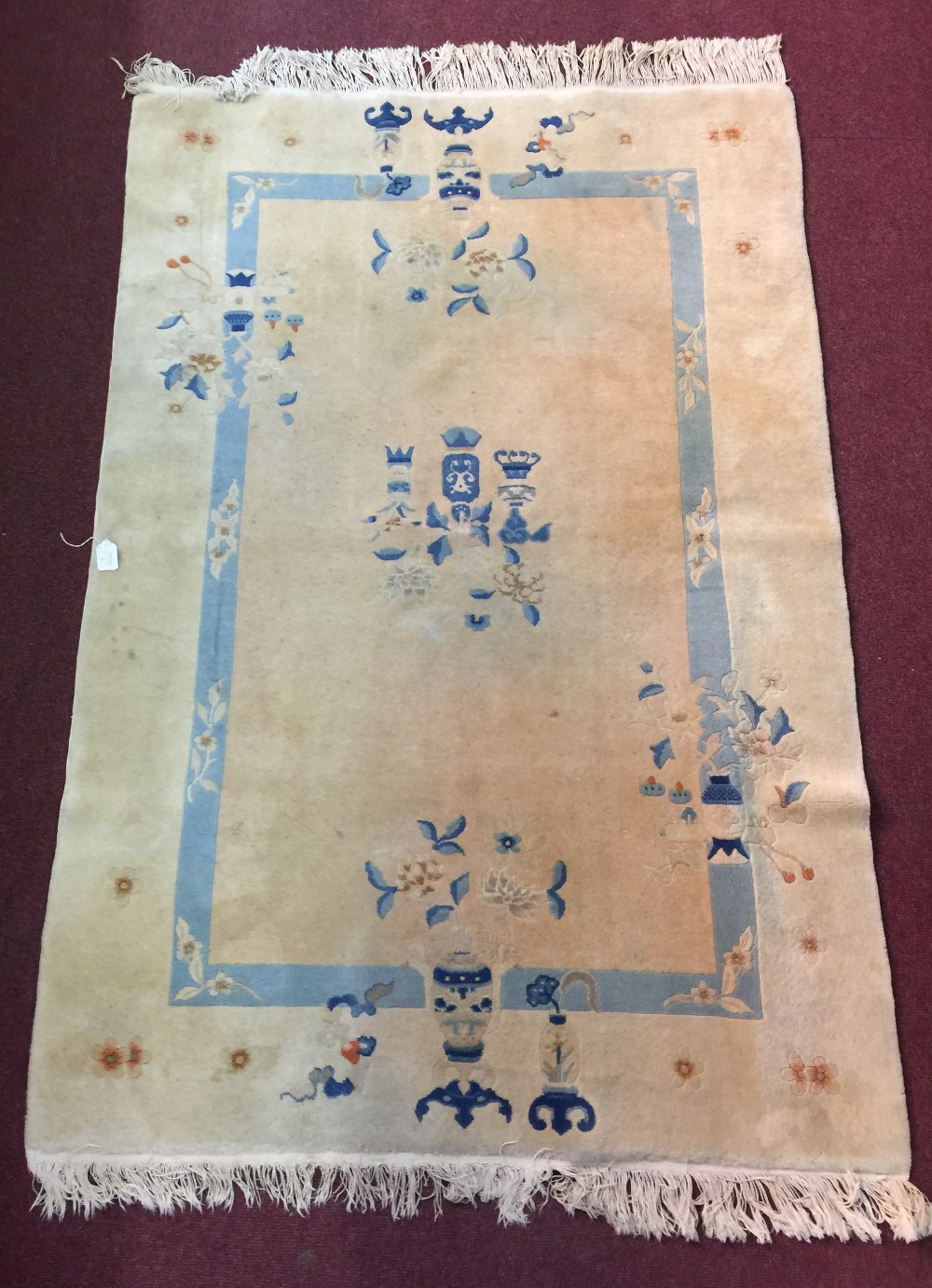 Carpets & Rugs: 20th cent. Washed Chinese, cream ground with blue border & brown oriental designs.