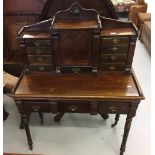 19th cent. Mahogany desk drop down slope opening to reveal a stationary cupboard flanked by banks of