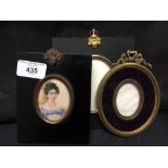 19th cent. Miniature painting of a Georgian lady in a modern frame, and two others and empty frames.