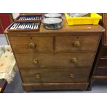 19th cent. Veneered 2/2 chest of drawers, with a plinth, on later bun feet. 35ins. x 35½ins. x 19½