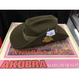 Australian 'Akubra' fur felt slouch hat with map & sunburst badge, leather chin strap in original