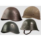 Vier Helme, 20.Jhdt. Ein niederländischer Stahlhelm M 34 mit olivgrün lackierter Glocke,