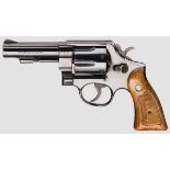 Smith & Wesson Mod. 58 Kal..41 Magnum, Nr. S296667. Blanker Lauf, Länge 4{. Hochglanzbrünierung,