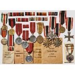 A Group of Medals Four East medals, West Wall medal, 1 October 1938 medal, three Kriegsverdienst