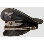 A visor hat for officers of the Luftwaffe Blue-grey gabardine, black mohair centre band, silver wire