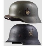 Zwei Stahlhelme mit beiden Emblemen Stahlhelm M 35 mit 90 % der glatten, feldgrauen Lackierung