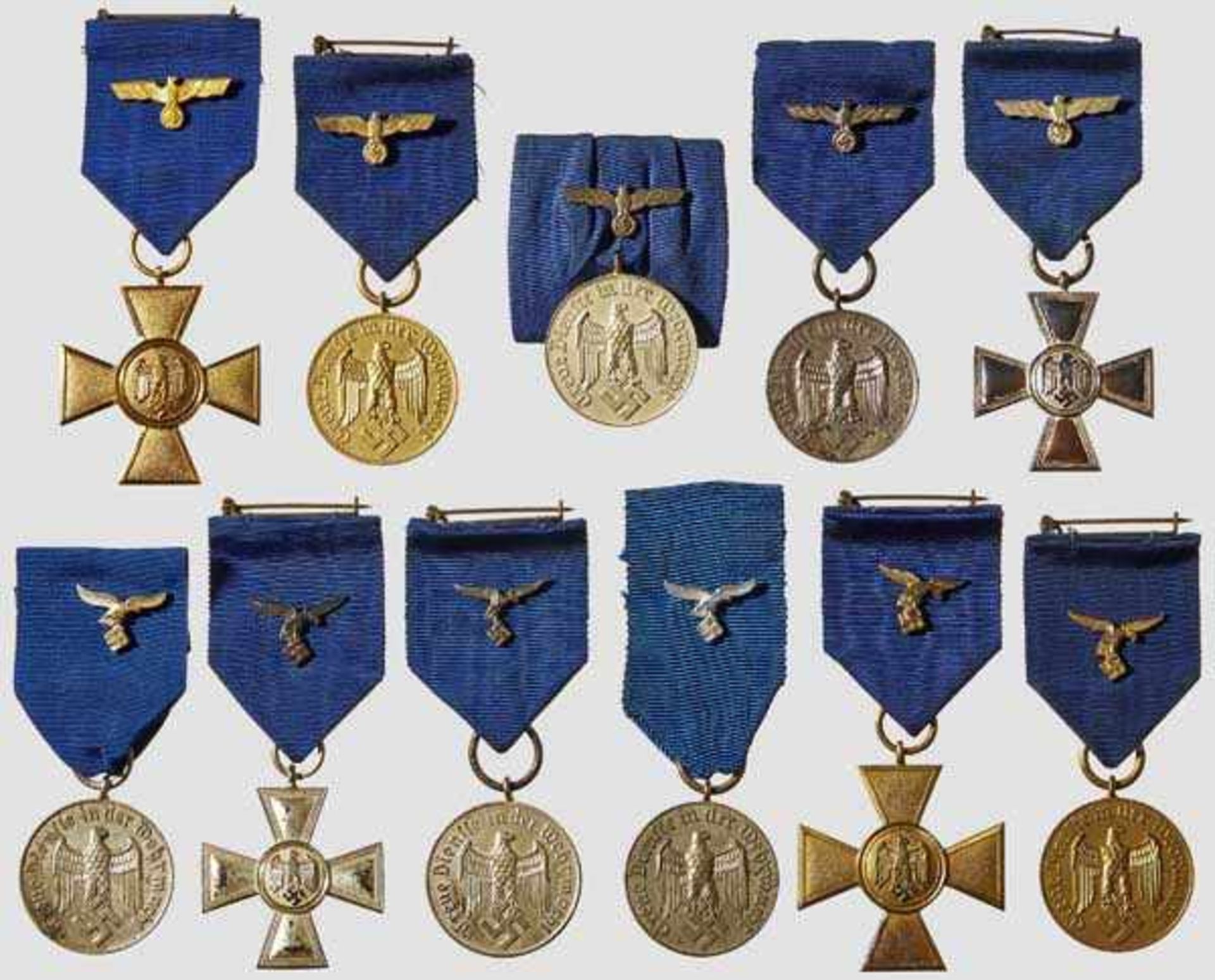 A Collection of Wehrmacht Service Awards Eleven awards representing four stages of the Wehrmacht