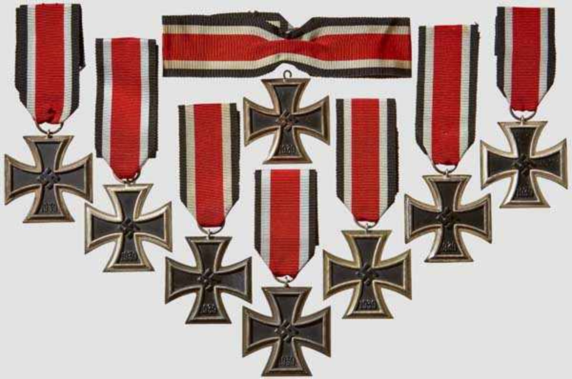 A Collection of Iron Crosses 1939 II Class Eight examples, each with black lacquered magnetic core