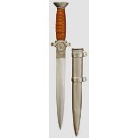 A Model 1938 Dagger for Leaders of the German Red Cross Unmarked polished blade. Nickel-plated