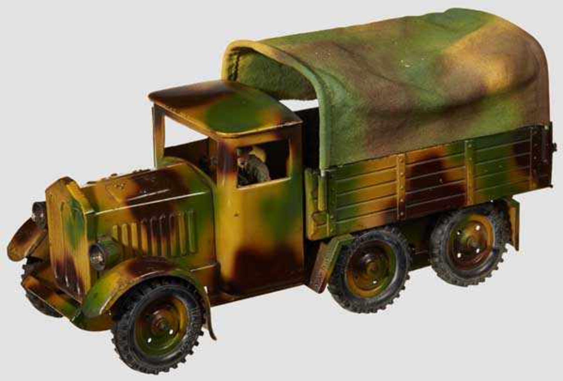A Hausser # 734 Military Transport Truck with Driver Hausser, 7cm series, exhibits only light