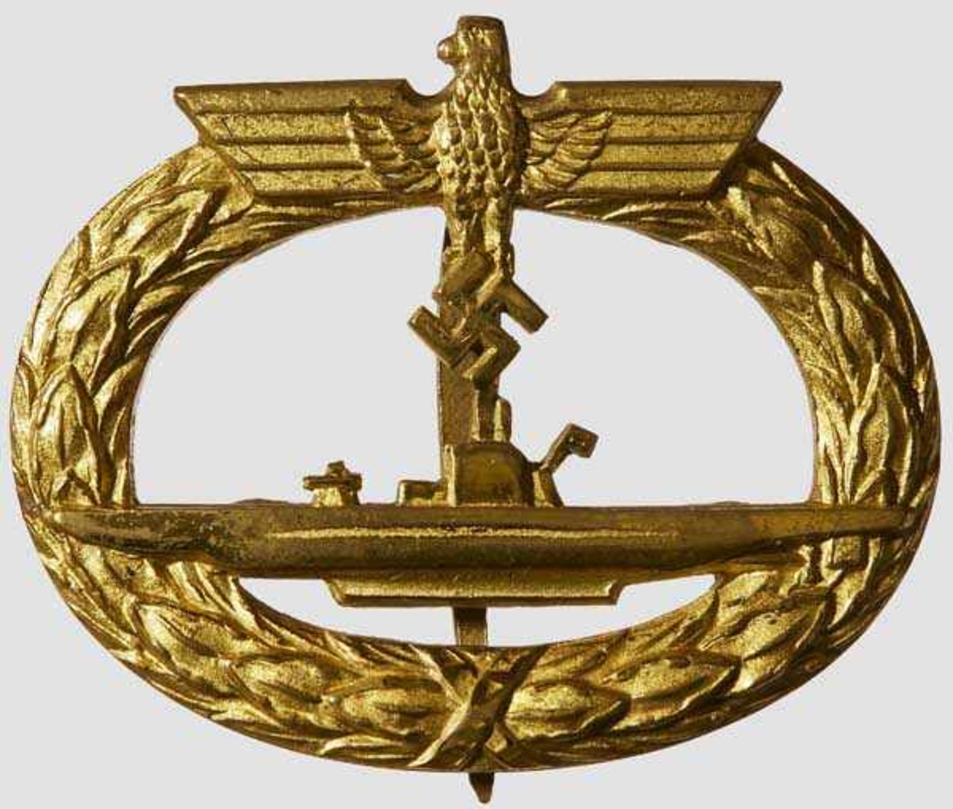 A Submarine War Badge Gilded tombak, slightly convex with hinge, pin and catch. Reverse stamped {