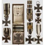 A Collection of Seven Iron Crosses 1914 II Class Black lacquered magnetic cores in silvered