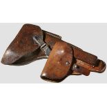 Two Pistol Holsters PPK holster of smooth brown leather with national emblem acceptance stamp, 1942,